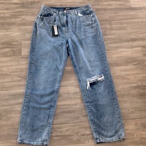 Ripped knee straight leg jeans